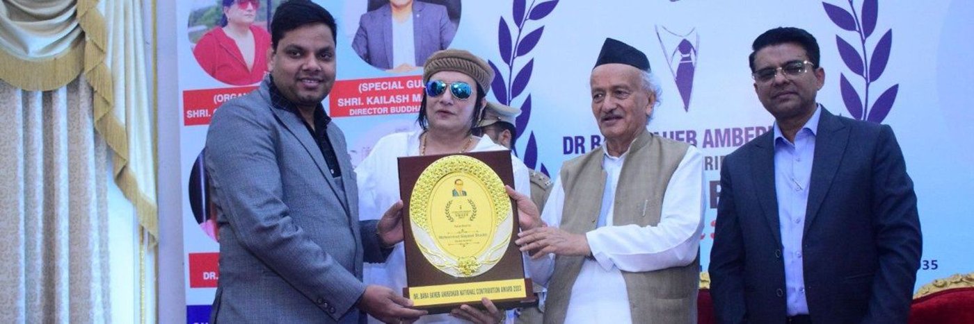 Mohammed Sayeed Shaikh receiving the Dr. Babasaheb Ambedkar National Contribution Award from the Governor