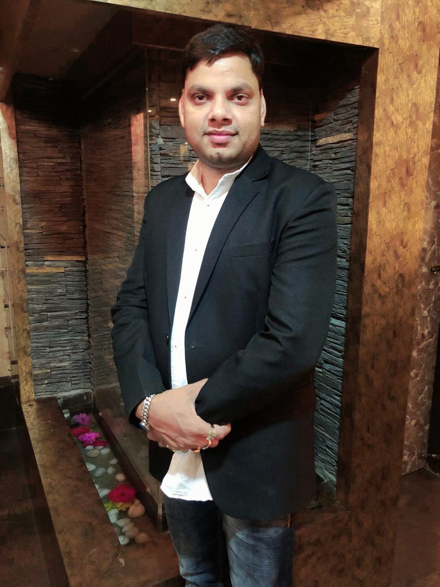 Mohammed Sayeed Shaikh in press attire at an FAC News event